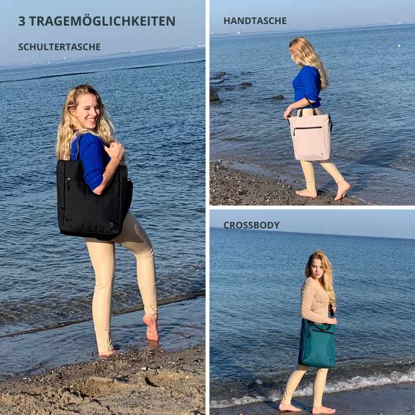 Frau spaziert am Strand mit den FUCHS und REBELL JONA Umhaengetaschen und zeigt die drei Tragemoeglichkeiten - Cross-Body, Schultertasche, Handtasche.