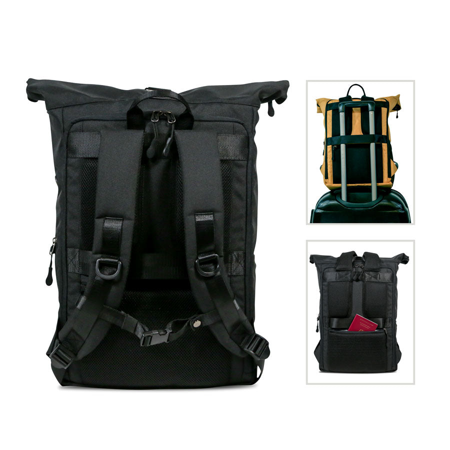 Rueckenansicht des schwarzen FUCHS und REBELL PIET Rolltop Rucksacks mit gepolstertem Ruecken und Schultergurten, abnehmbarem Brustgurt, stabilem Koffergurt und Anti-Diebstahlfach.