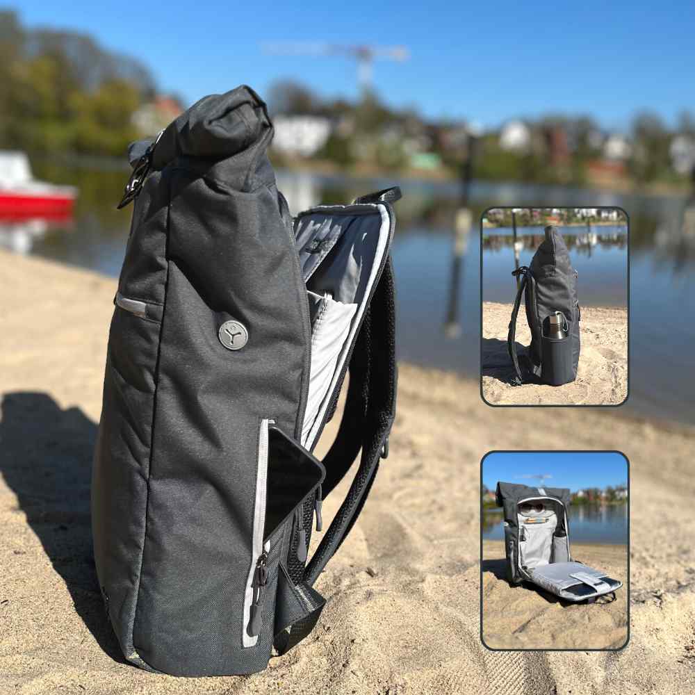 Innenansicht des FUCHS und REBELL PIET Rolltop Rucksacks in dunkelgrau mit vielen praktischen Faechern.